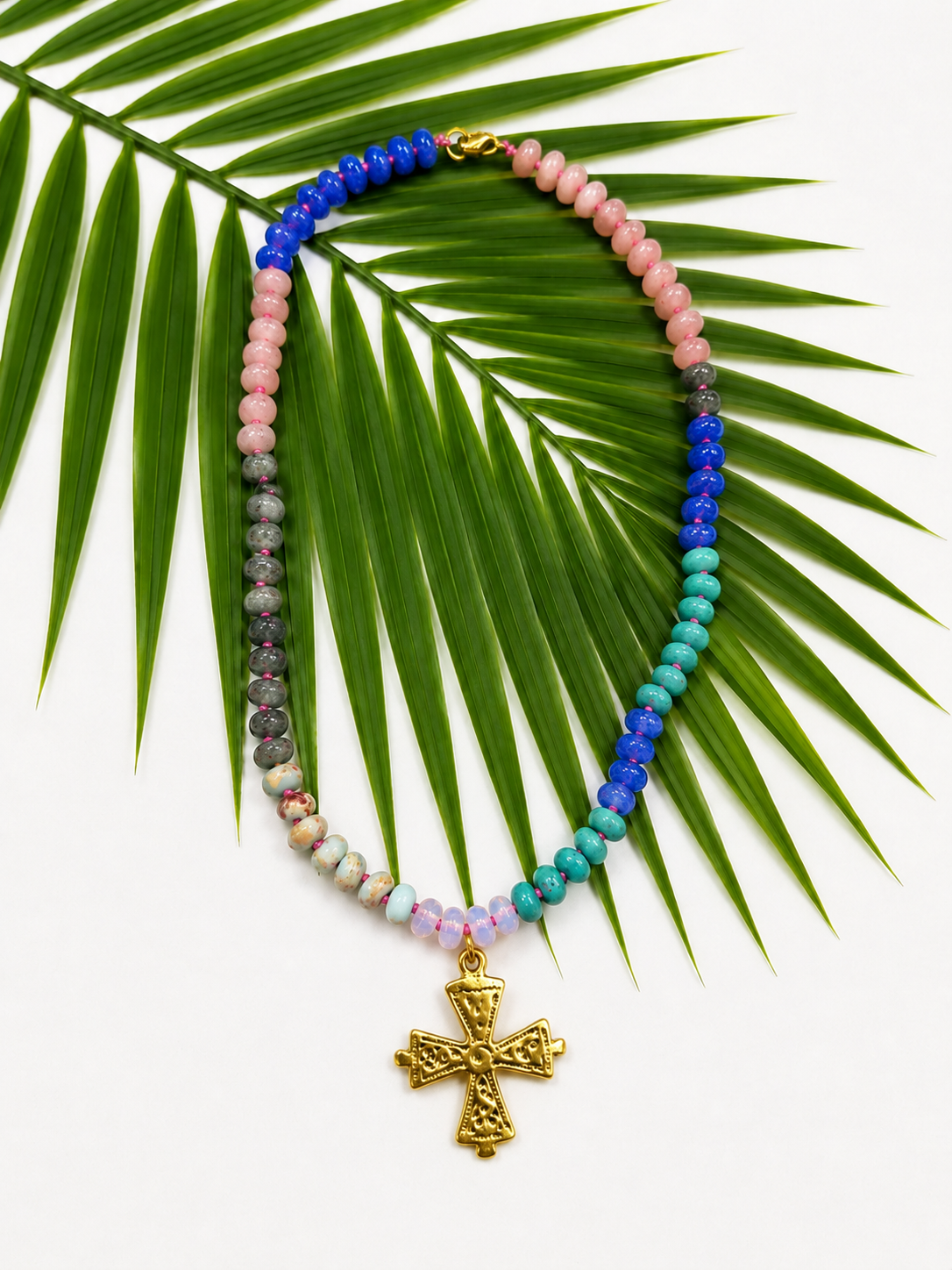 The Palm Grace Cross