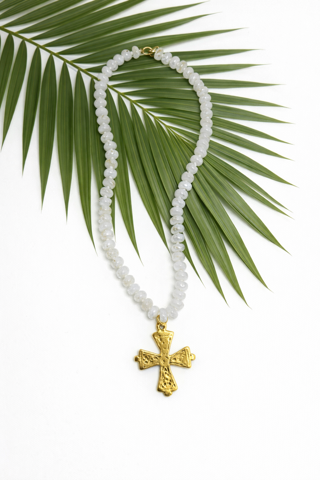 The Palm Grace Cross