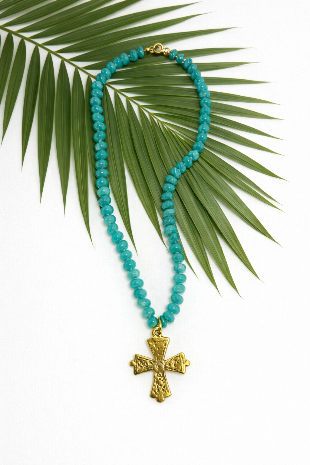 The Palm Grace Cross
