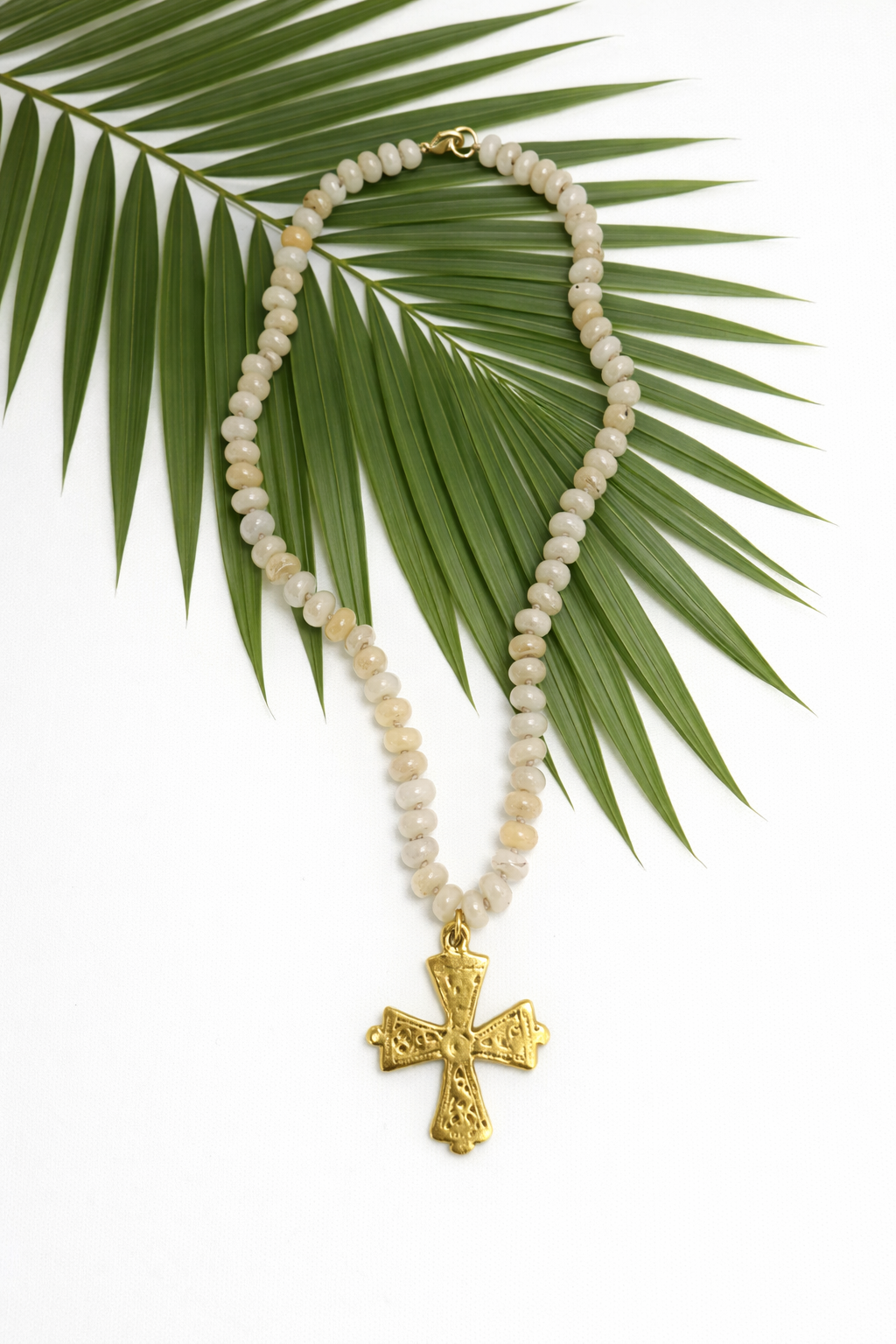 The Palm Grace Cross