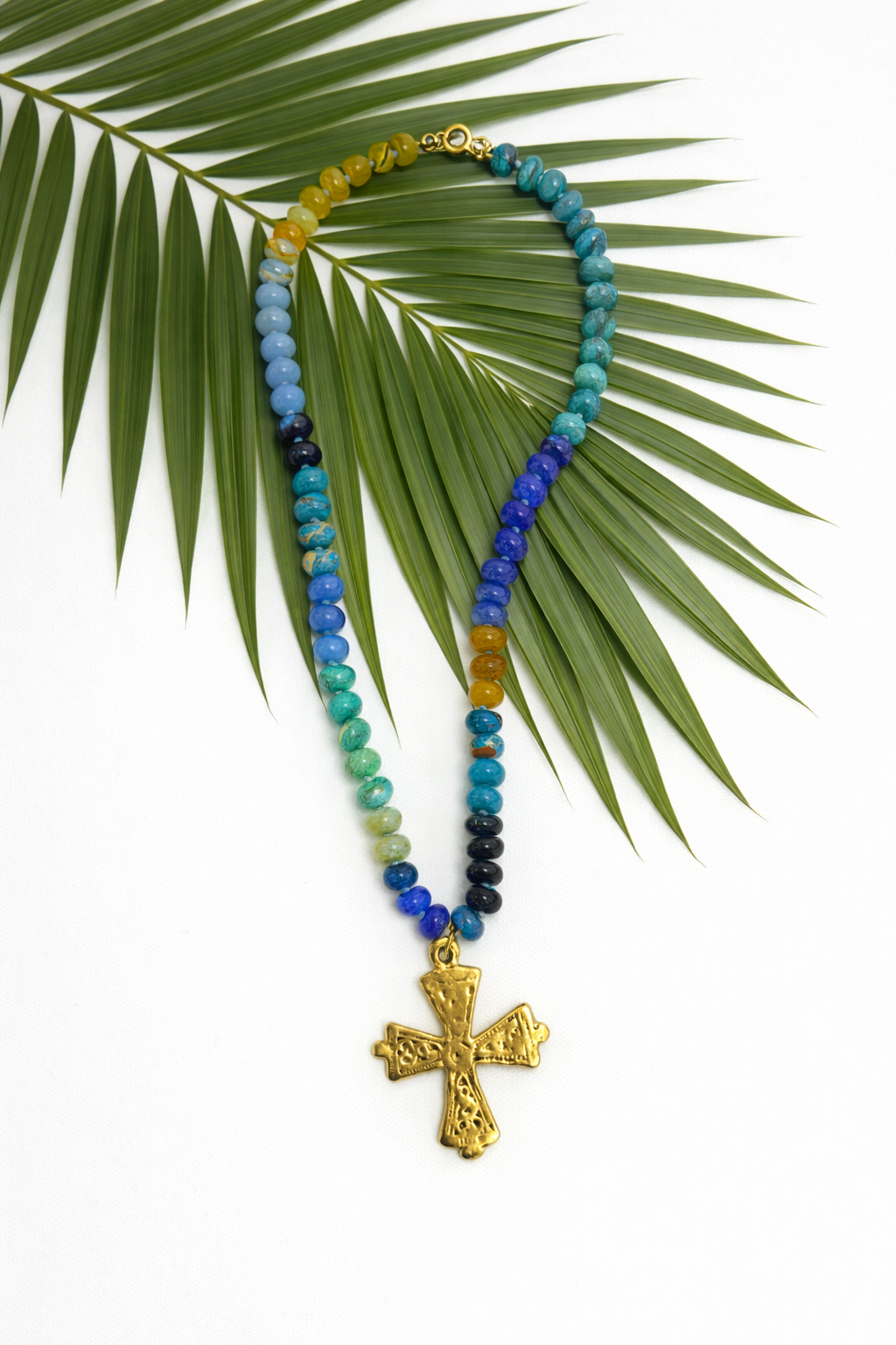 The Palm Grace Cross