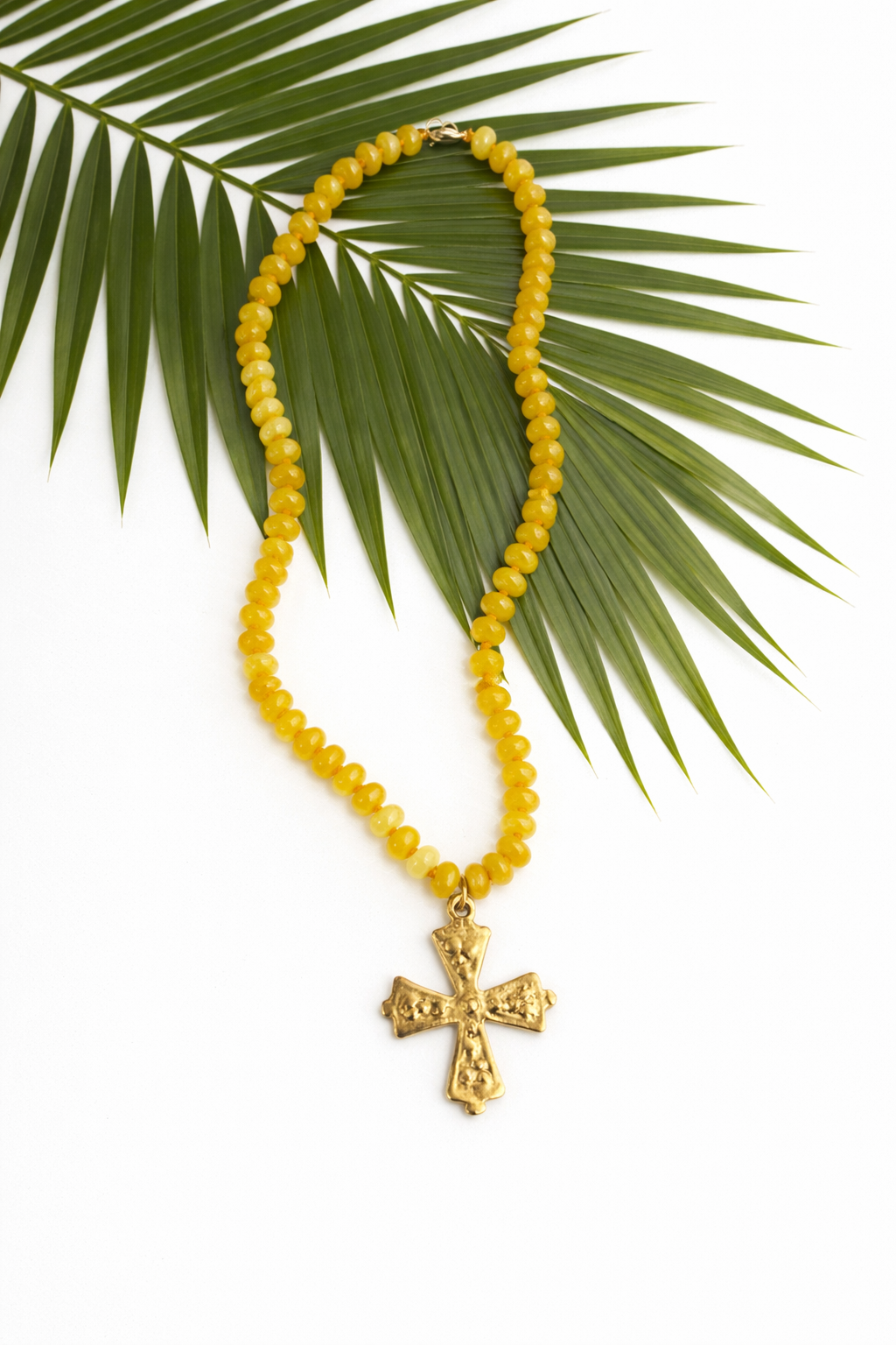 The Palm Grace Cross