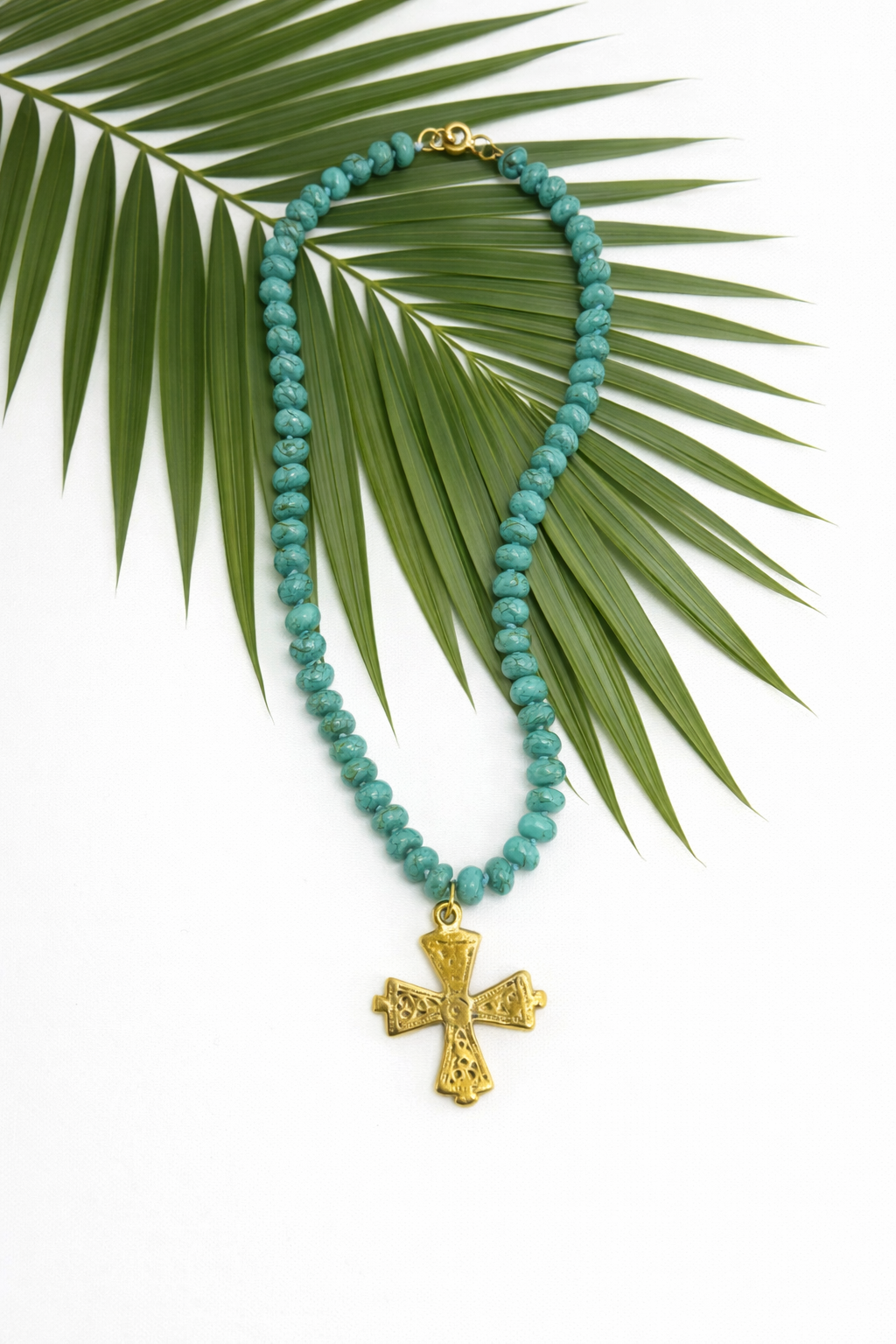 The Palm Grace Cross