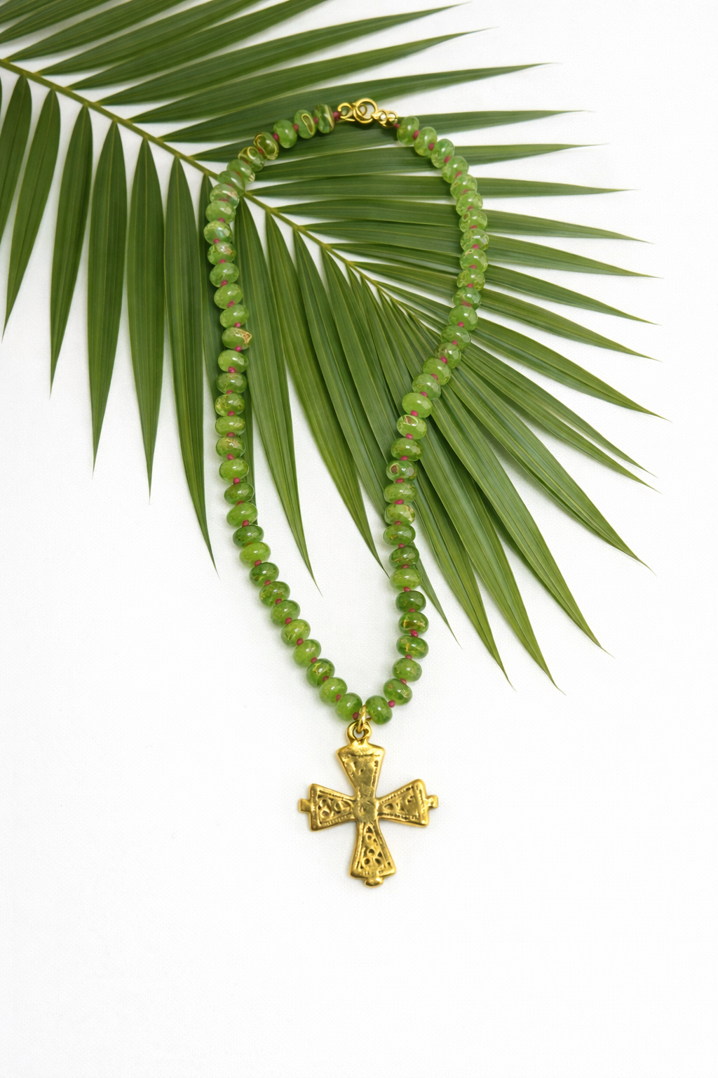 The Palm Grace Cross