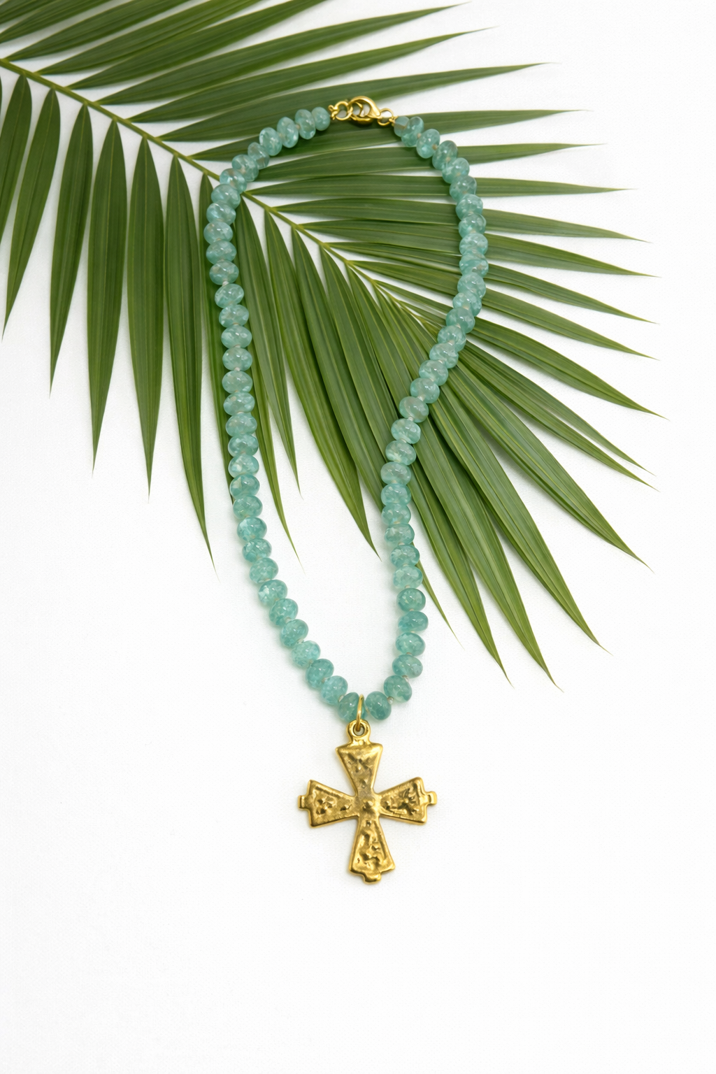 The Palm Grace Cross