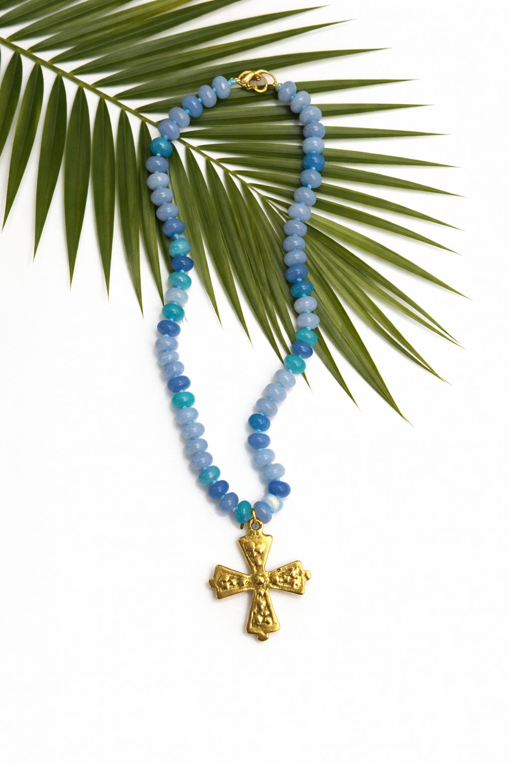 The Palm Grace Cross